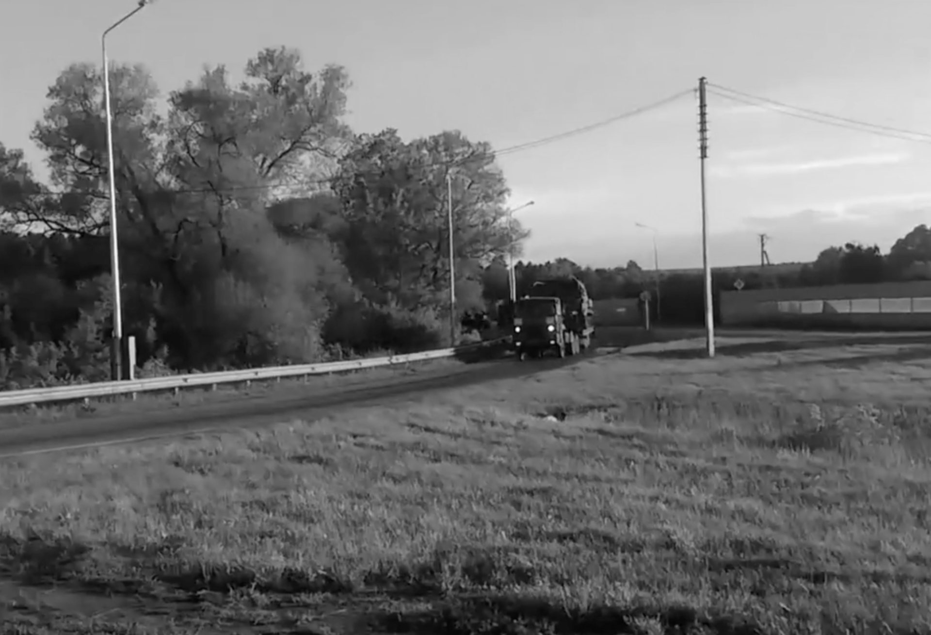 Military convoy filmed from roadside, eastern Ukraine
