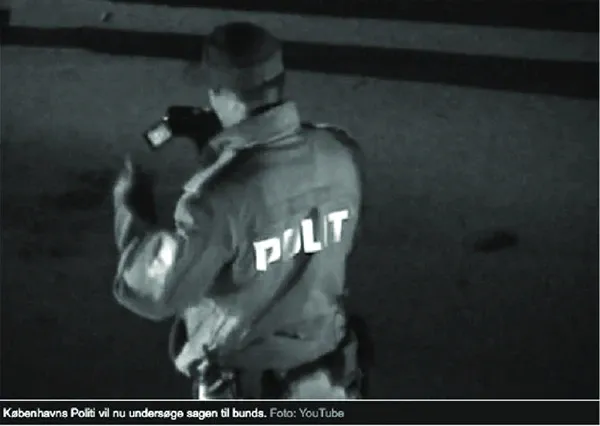 Anonymous citizen recording of police officer filming street clashes by the Brorson Church in Copenhagen.